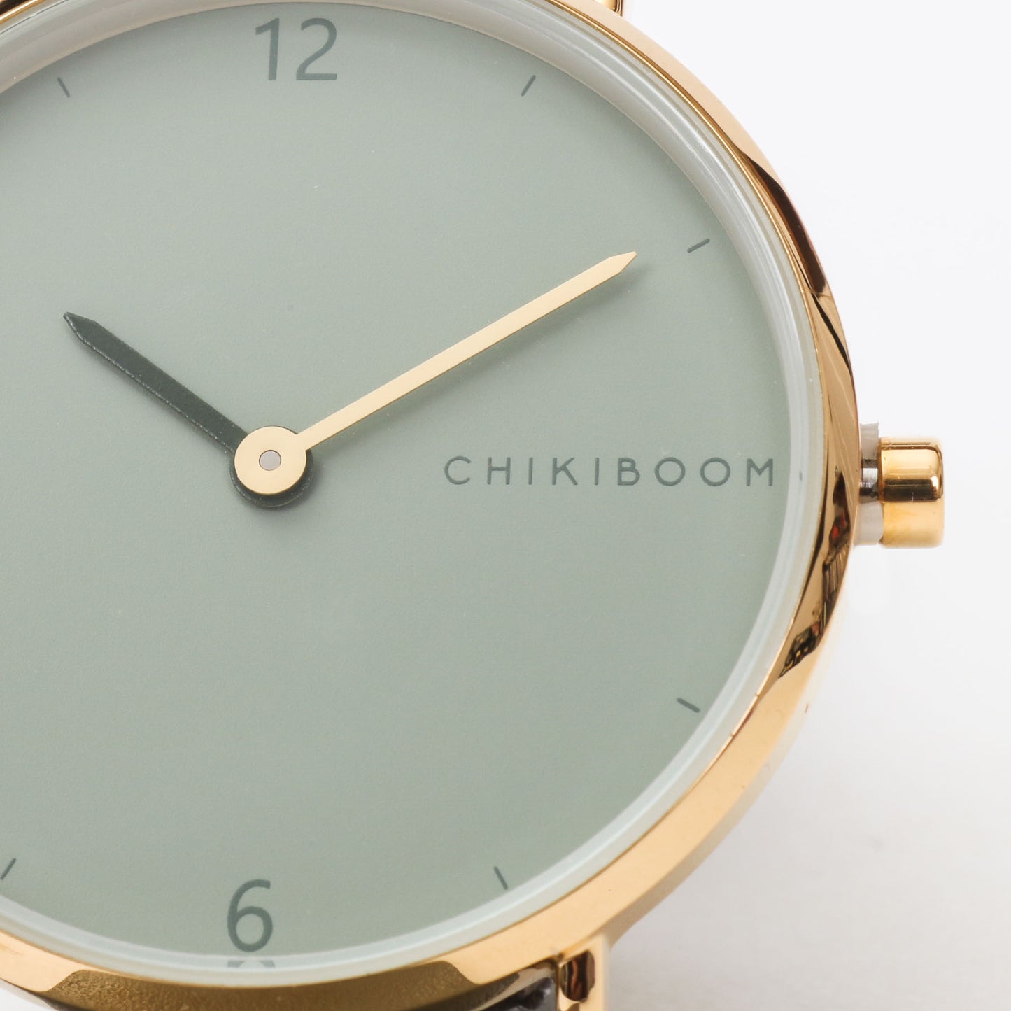 White / sage and gold watch
