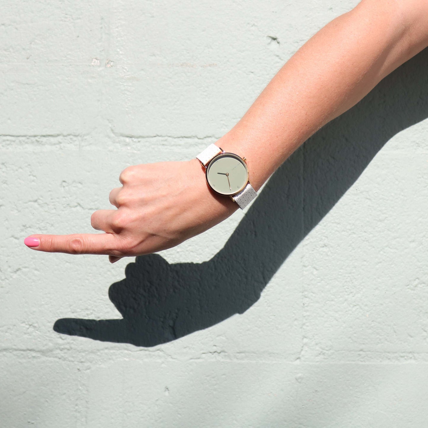 White / sage and gold watch