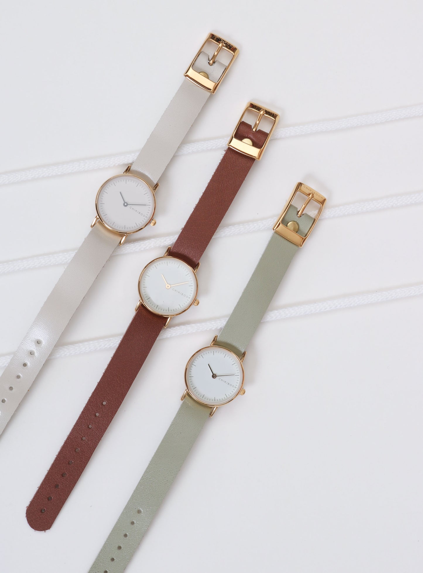 Montre femme saumon / crème et or