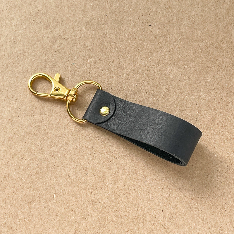 Porte-clé noir - or