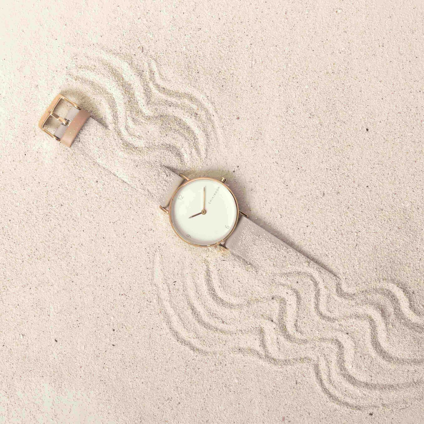 Beige / white and gold watch