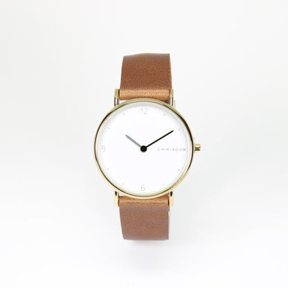 Beige / white and gold watch