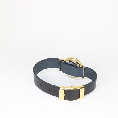 Montre femme noir / crème et or
