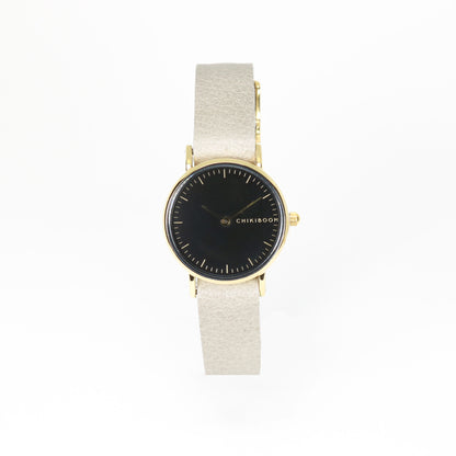 Montre femme gris chaud / noir et or