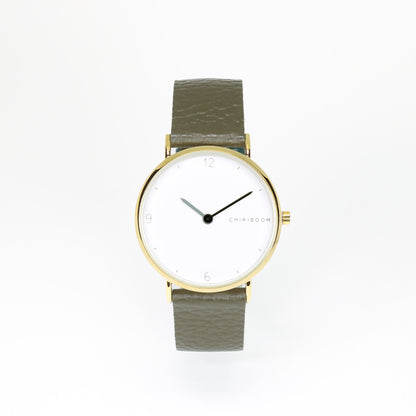 Textured green / white and gold watch
