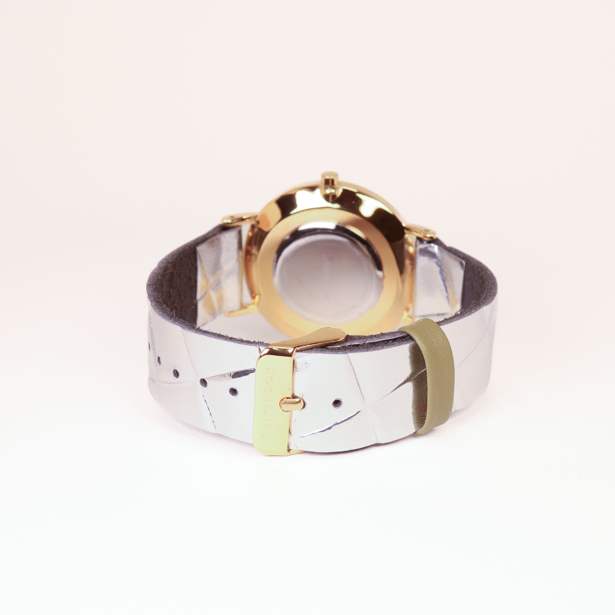 Dark brown / white and gold watch