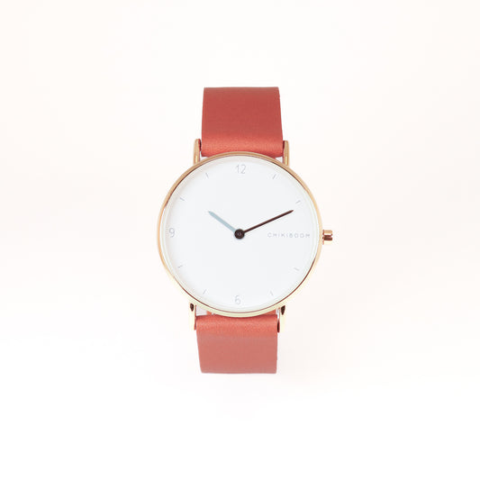 Dark brown / white and gold watch