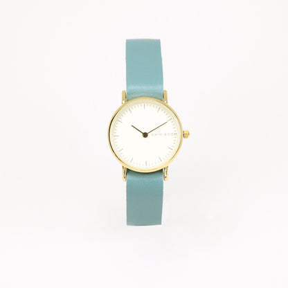 Montre femme turquoise / crème et or