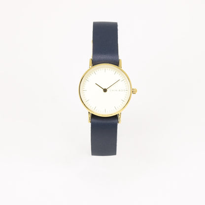 Montre femme marine / crème et or