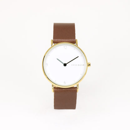 Montre brun foncé / blanc et or