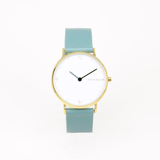 Turquoise / white and gold watch