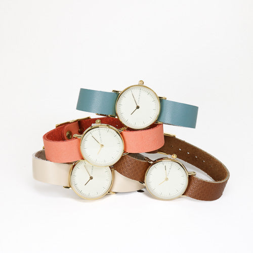Montre femme saumon / crème et or
