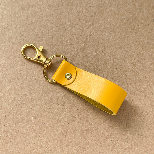 Porte-clé jaune - or