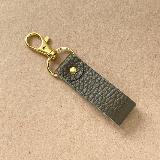 Porte-clé vert texturé - or